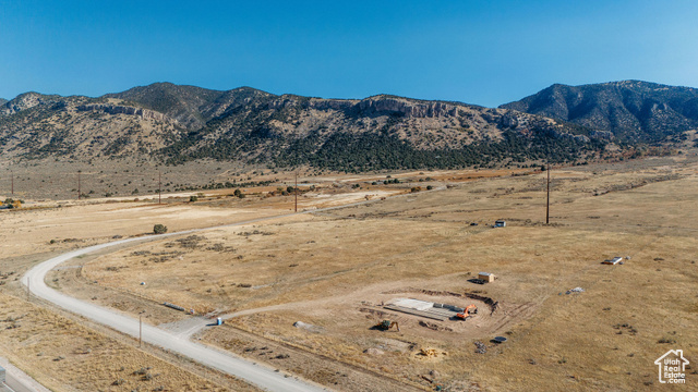 Property view of mountains with a rural view