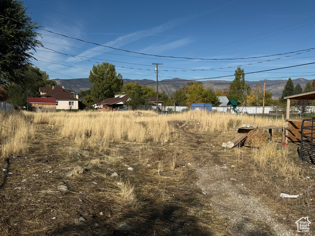 View of yard with a mountain view