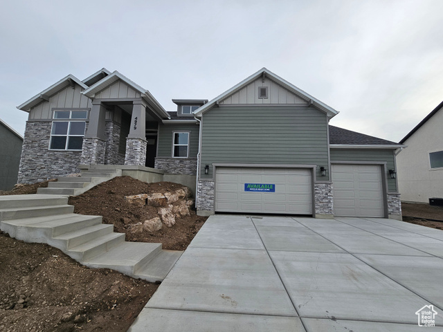 Craftsman-style home with a garage