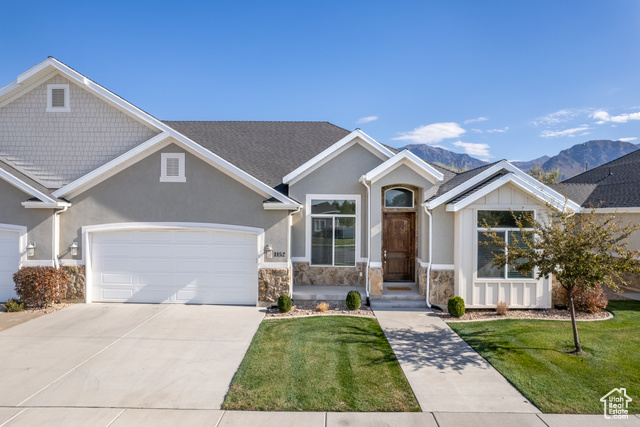 View of front of house featuring a mountain view.