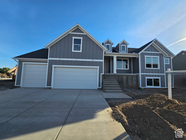 View of front of property with a garage