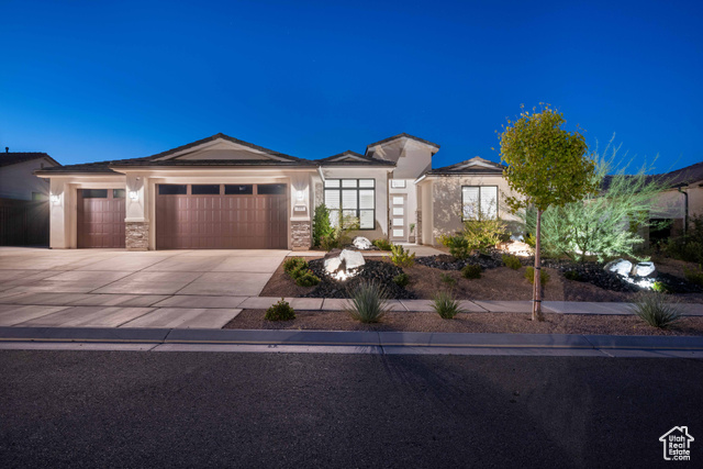 Prairie-style house featuring a garage