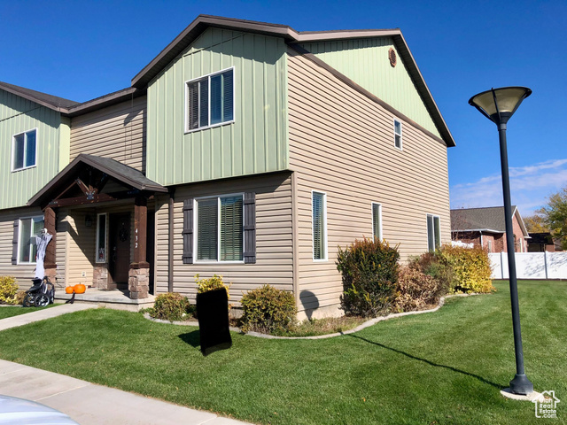 View of front of home with a front yard