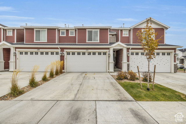 View of property featuring a garage