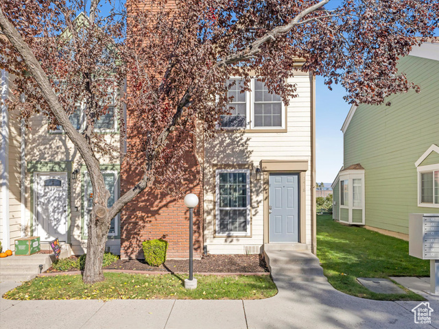 View of front of property featuring a front lawn