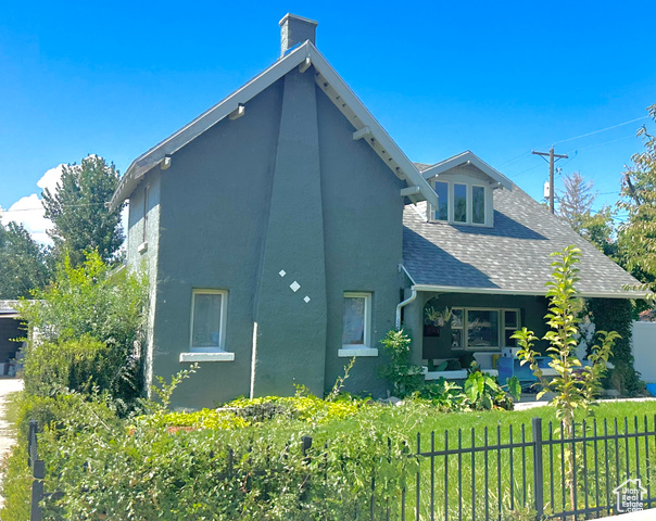 Exterior space featuring a yard