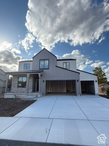 View of front of home with a garage