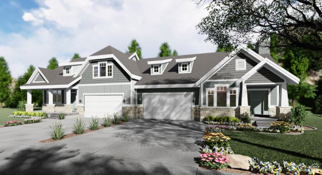 Craftsman-style home with a front yard and a garage