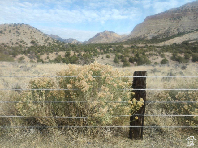 View of mountain feature with a rural view