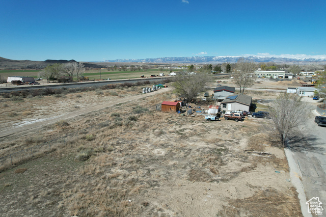 Drone / aerial view with a mountain view and a rural view