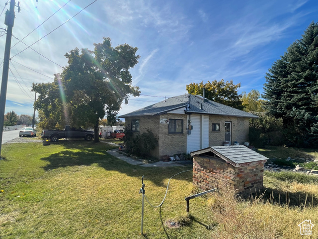 RARE corner 1 acre horse property with older two bedroom home, hay barn, sheds, and animal rights in Lehi city limits where land can be rezoned to have at least two more lots facing the streets facing north and east.    Buyer can live in the existing house and build two other homes right next door after rezoning and finishing lot improvements with city on the two existing streets (500 South and 300 W).  Home on corner could also be torn down to build on third lot if rather than living in existing hom after making improvements.  Well has not been used for years since home is on city water with pressurized irrigation. Parent passed away and property is being sold.  One son is staying in the home and will being given notice to leave depending on timelines negotiated with buyer.  Drive buy!!!