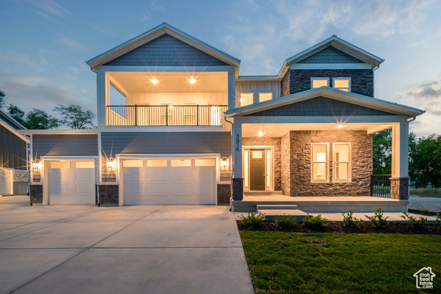 View of front of home featuring a garage