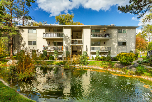 View of building exterior with a water view