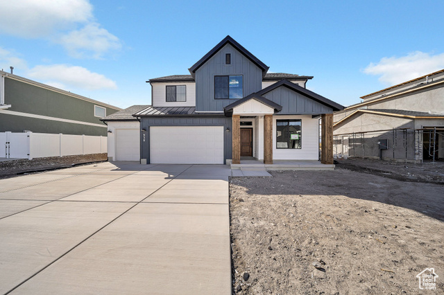 Modern farmhouse style home with a garage