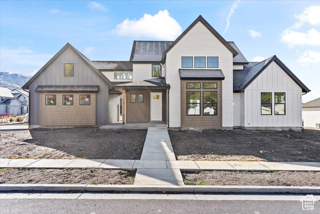 View of modern farmhouse style home