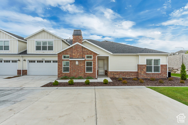 South Jordan's highly desired, Haven villas 55 + plus, active adult community.  This popular, open and spacious Sawyer plan offers 9' and vaulted ceilings, open concept layout, no stairs into the home from any entry point and is upgraded to the max!  This home does not disappoint from the stunning kitchen that features maple, white, clerestory cabinetry, with upper and under cabinet lighting, quartz counters, custom tile backsplash, ss appliances and a huge peninsula that easily seats 4 at the bar. Cozy & beautiful , gas, white stone, fireplace, upgraded black light fixtures and hardware, barn door at the darling pocket office, upgraded LVP flooring, 5' baseboards & trimmed window sills are just a few of the upgraded features in this home.   TWO master suites, one offering a spacious, no-step, roll-in shower with a gorgeous euro enclosure and door, double sinks, adult height vanity and an ADA toilet.   This home and community is truly unbeatable!  The incredible, large clubhouse features a massive open gathering space, huge kitchen, dining room, reading corner, gym, showers as well as an outdoor pool, hot tub and pickleball court.