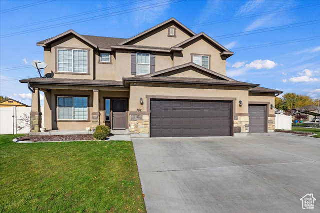 Welcome to this inviting two-story home, offering both charm and functionality. With a spacious three-car garage, this residence provides ample room for vehicles and storage. The interior boasts a bright, open layout, perfect for entertaining or family gatherings. The heart of the home, the kitchen, features beautiful wood cabinetry and an island, opening to a cozy dining area bathed in natural light. Upstairs, the primary bedroom offers a peaceful retreat with generous closet space. Outdoors, the expansive backyard is perfect for relaxation or play, complete with a built-in trampoline. Situated near a park, this home combines comfort with convenience.