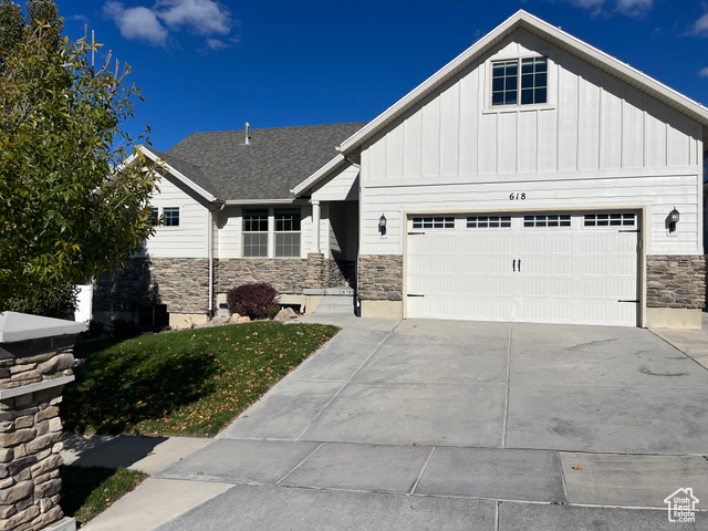 Modern rambler plan with bonus room over the garage.  Features a finished basement with a walkout entrance, kitchen, laundry room. two baths and three bedroom. Basement is ready to rent to help offset monthly payments.