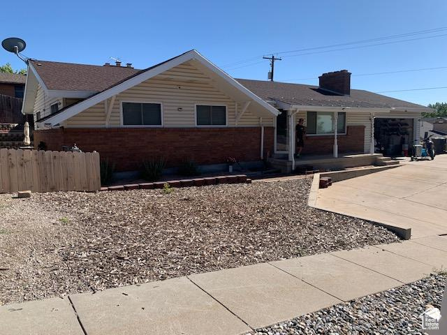 Single story home featuring a garage