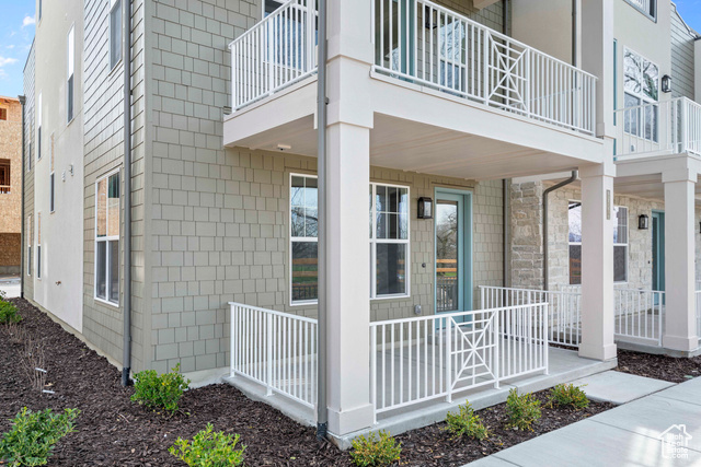 View of property exterior with a balcony