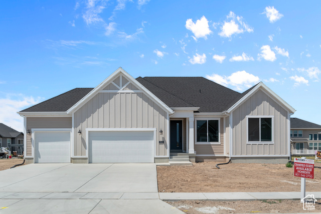 View of front of home featuring a garage