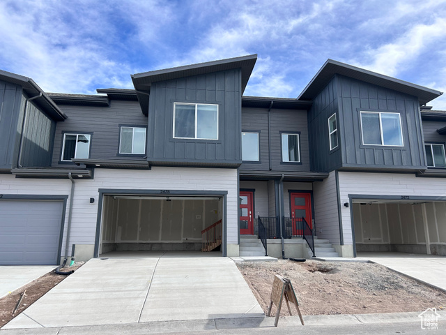 Jordanelle Ridge - 157 - Residence M. Offering rates as low as 2.875% (5.267% APR) on a 2/1 buydown 30 yr fixed when financing through Lennar Mortgage! Estimated completion in December. This home offers 3 bedrooms, 2.5 bathrooms, and an attached 2-car garage and an unfinished basement. On the main floor, a spacious kitchen offers white craftsman-style cabinets, grey quartz countertops, and stainless steel appliances including refrigerator! Upstairs is the owner's suite with a spacious bathroom, laundry room, two additional bedrooms, and a full secondary bathroom. Blinds included. Square footage figures are provided as a courtesy estimate only and were obtained from builder. Buyer is advised to obtain an independent measurement.