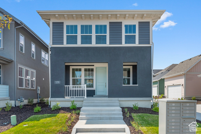 View of front of property featuring covered porch