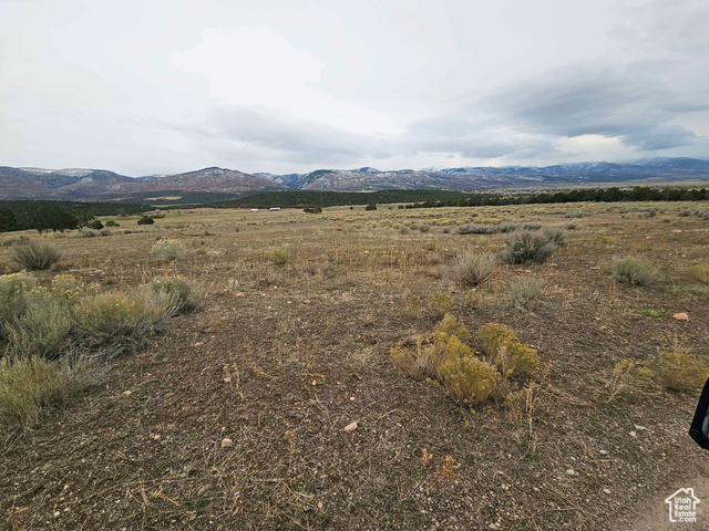 Property view of mountains featuring a rural view