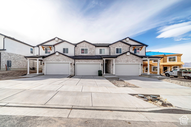 View of front of home featuring a garage