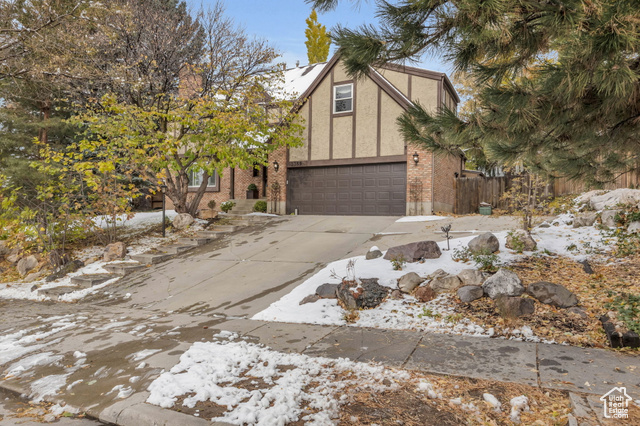 View of front of home featuring a garage