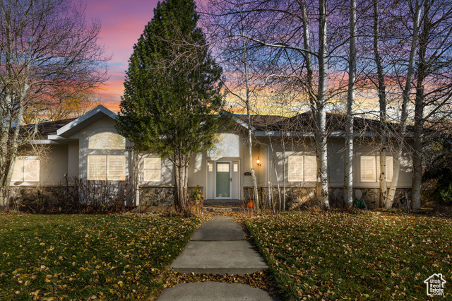 View of front of home at twilight