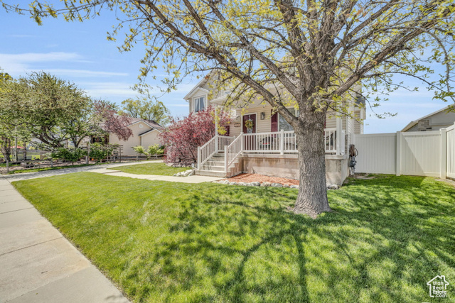 View of front of house with a front lawn