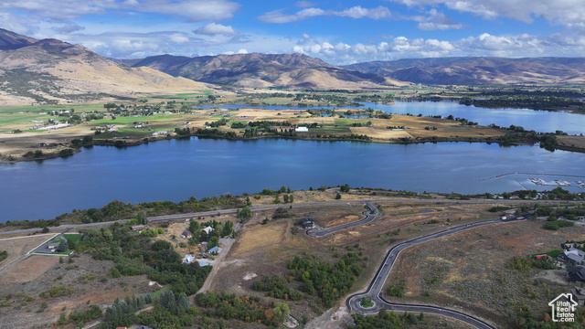 Bird's eye view with a water and mountain view