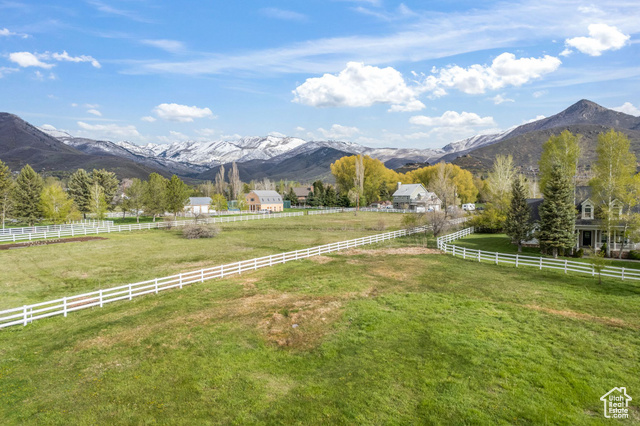 Property view of mountains featuring a rural view