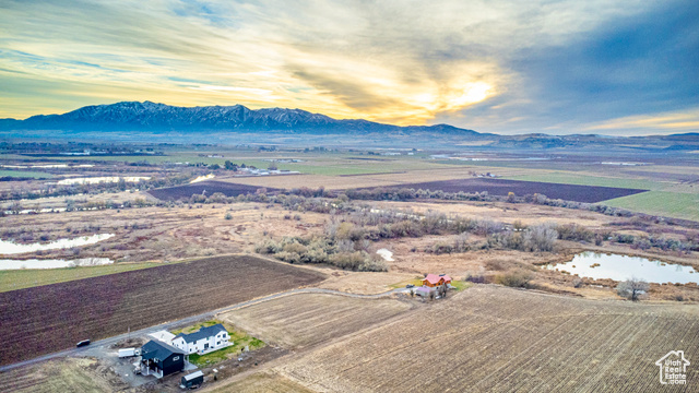 Aerial view at dusk with a rural view and a water and mountain viewSouth East View