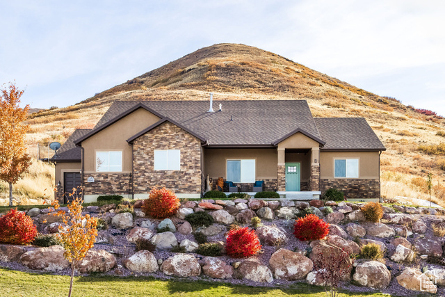 View of front of home with a mountain view