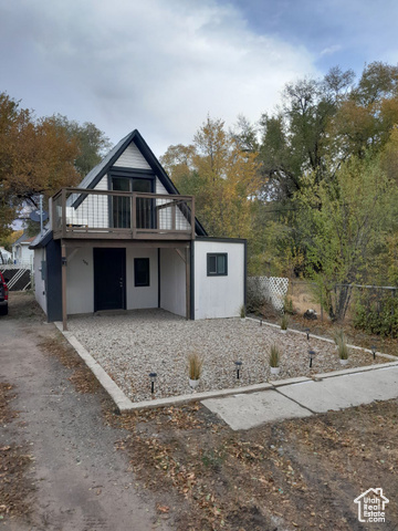 View of front facade with a deck