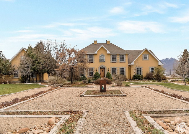 View of front of property with a mountain view