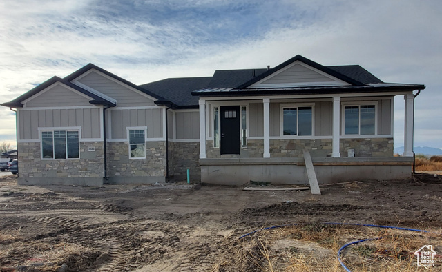 View of front of home featuring covered porch