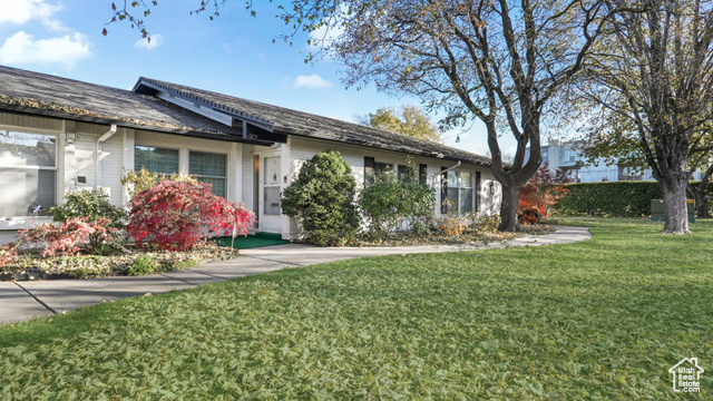 View of front of home with a front lawn