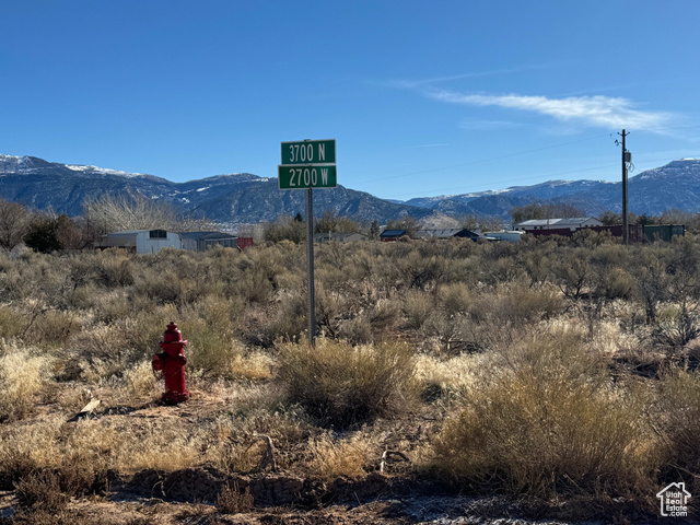 Property view of mountains featuring a rural view