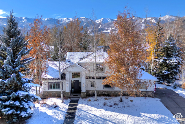 View of front of home featuring a mountain view