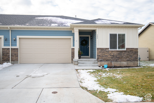 View of front of property with a garage