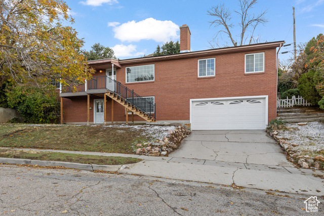 View of front of home featuring a garage