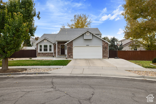 View of front of home featuring a garage