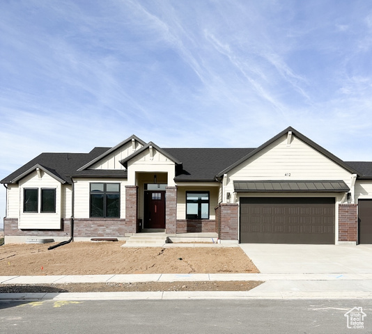 View of front of house with a garage