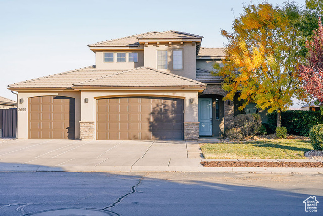 View of front of home with a garage