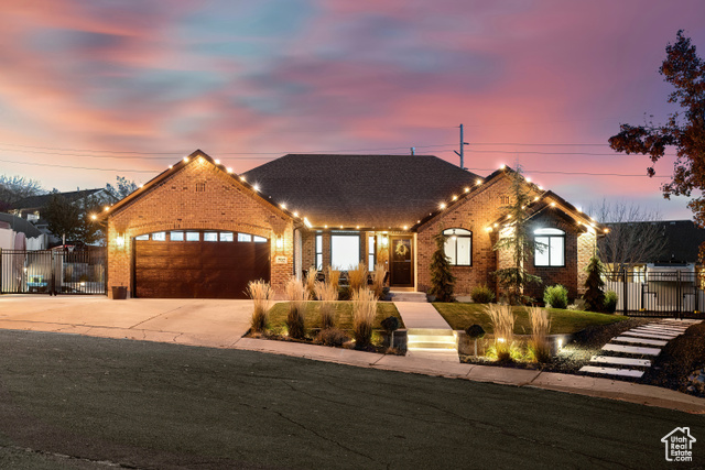 View of front of property featuring a garage