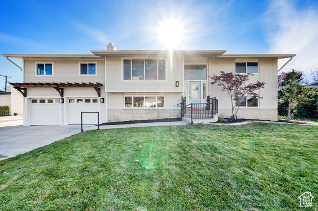 Amazing fully remodeled home with Mother-in-law apartment! Plenty of parking with the 4 car garage. Great views with amazing master suite with large walk in closet and spacious master bathroom.