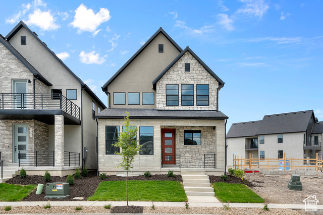 Come see this beautiful Stockholm Home that blends contemporary design with practical features. The kitchen showcases gray laminate cabinets, quartz countertops, and stainless steel gas appliances, complemented by a tile backsplash for a polished finish. Durable laminate hardwood, tile, and carpet flooring flow seamlessly throughout the home. The layout incorporates thoughtful elements such as can lighting, a Christmas light package, and energy-efficient options, ensuring both style and functionality. Classic details like Craftsman base and casing and metal railing at the stairway enhance the home's character, while 2-tone paint creates a cohesive, modern aesthetic. The owner's bathroom is designed for relaxation, featuring quartz shower surrounds, adding a touch of luxury to this thoughtfully crafted home. Comes fully landscaped that is maintained by the HOA for care free living!